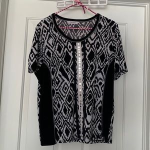 Tan jay top with figure flattering black side panels and sparkly details